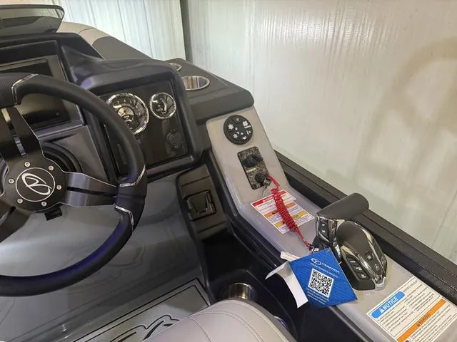 Slide: The Image of Cockpit of 2025 Veranda Relax VR22RCT with Yamaha 300, featuring steering wheel and controls. - 15