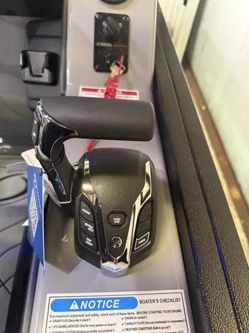 Slide: The Image of 2025 Veranda Relax VR22RCT boat throttle control with Yamaha 300 engine. - 16