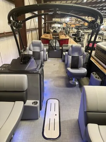 Slide: The Image of 2025 Veranda Relax VR22RCT pontoon boat interior with Yamaha 300, featuring modern seating and design. - 5