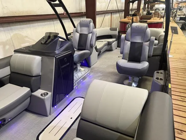 Slide: The Image of 2025 Veranda Relax VR22RCT pontoon boat interior with Yamaha 300, featuring luxurious seating and modern design. - 6