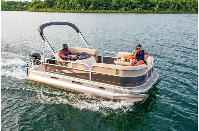 Slide: The Image of 2019 Sun Tracker PARTY BARGE 18 DLX pontoon boat cruising on a lake. - 15
