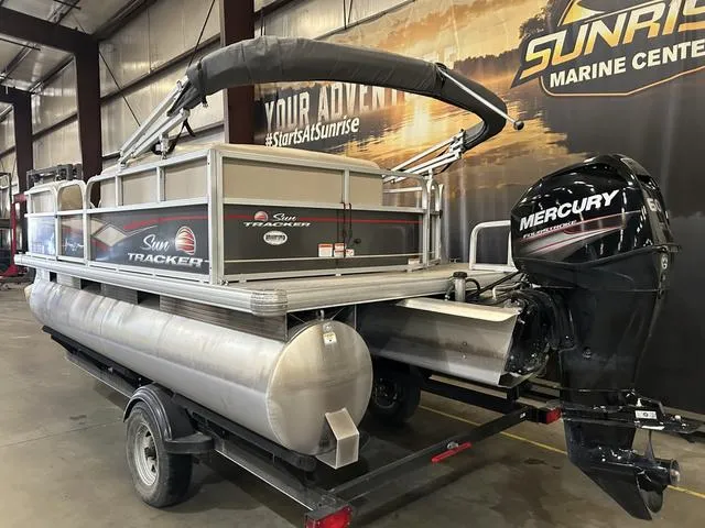 Slide: The Image of 2019 Sun Tracker PARTY BARGE 18 DLX with Mercury 60 engine in showroom. - 5