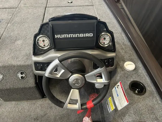 Slide: The Image of Steering console of 2025 G3 Sportsman 1910 with Humminbird display and Yamaha controls. - 13