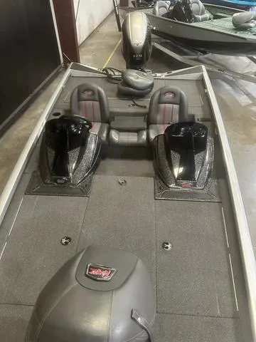 Slide: The Image of 2017 Ranger RT188 boat interior with Yamaha 115 SHO, featuring dual seats and storage compartments. - 10