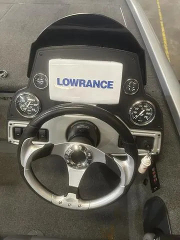 Slide: The Image of 2017 Ranger RT188 boat dashboard with Lowrance display and Yamaha 115 SHO controls. - 12