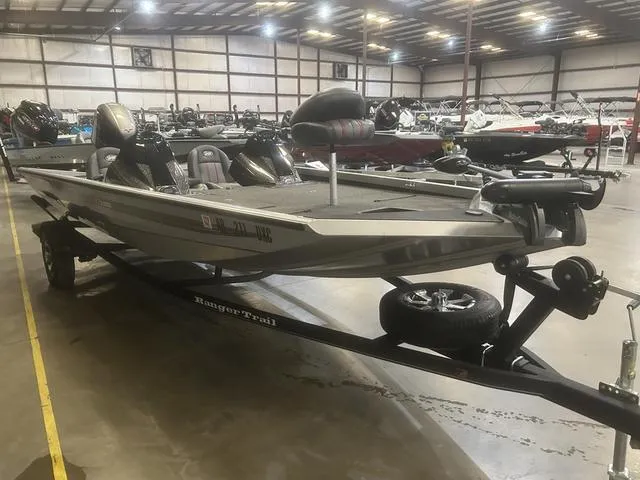 Slide: The Image of 2017 Ranger RT188 boat with Yamaha 115 SHO engine in a warehouse setting. - 3