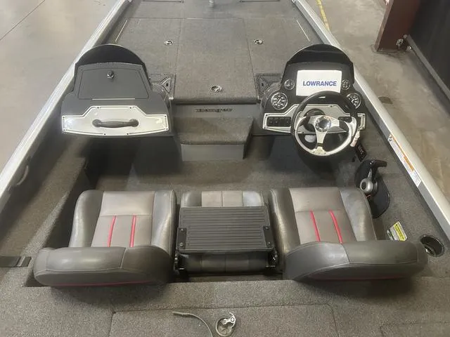 Slide: The Image of 2017 Ranger RT188 boat interior with Yamaha 115 SHO, featuring dual seats and Lowrance electronics. - 6