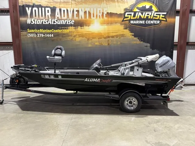 Slide: The Image of 2020 Alumacraft 175 Prowler with Honda 50 outboard, displayed at Sunrise Marine Center. - 1