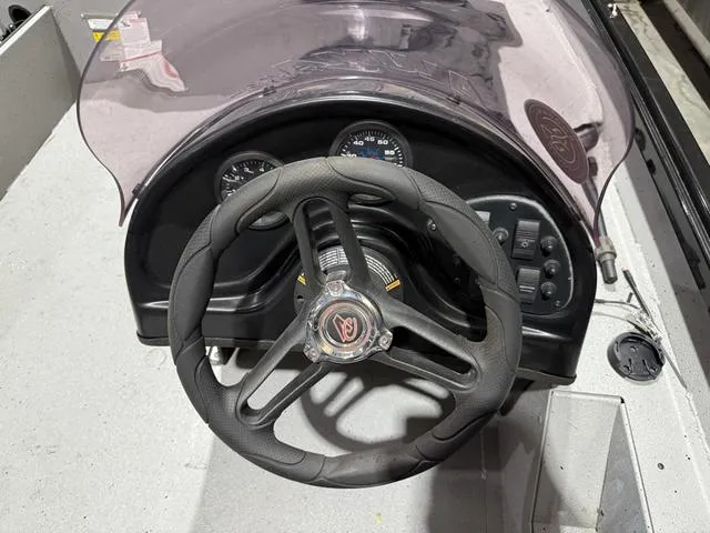 Slide: The Image of Steering wheel and dashboard of 2020 Alumacraft 175 Prowler boat with Honda 50 engine. - 13