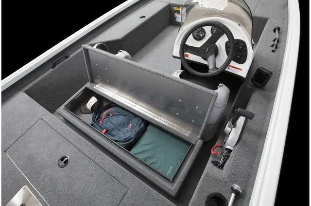 Slide: The Image of 2020 Alumacraft 175 Prowler boat interior with storage compartment and steering console. - 18
