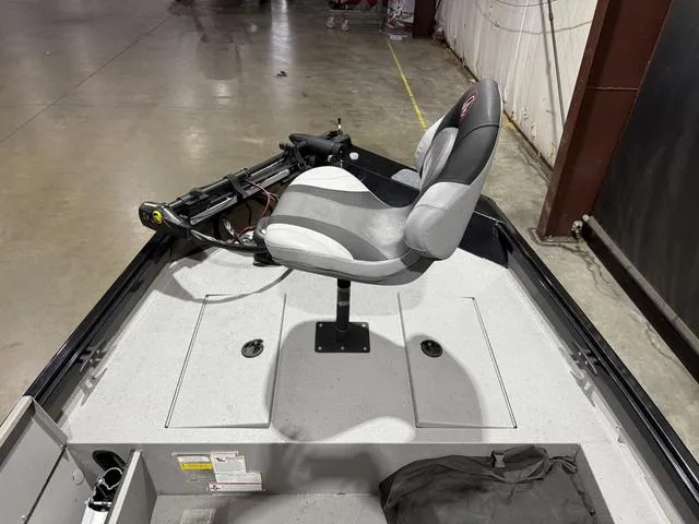 Slide: The Image of 2020 Alumacraft 175 Prowler boat interior with swivel seat and steering controls. - 6