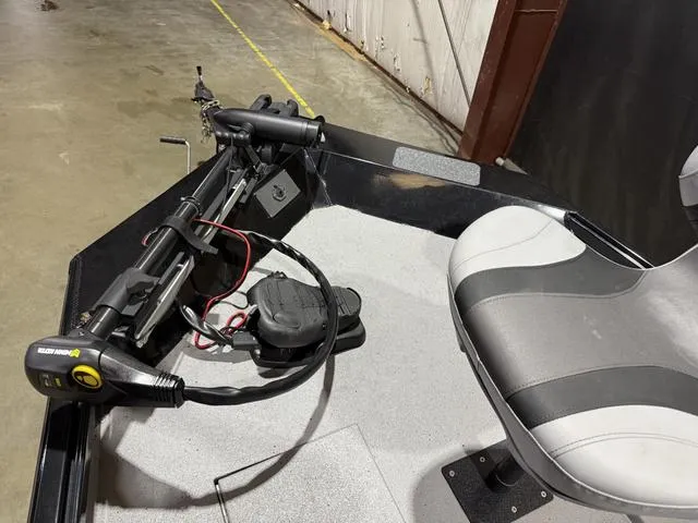 Slide: The Image of 2020 Alumacraft 175 Prowler boat interior with trolling motor and seat. - 7