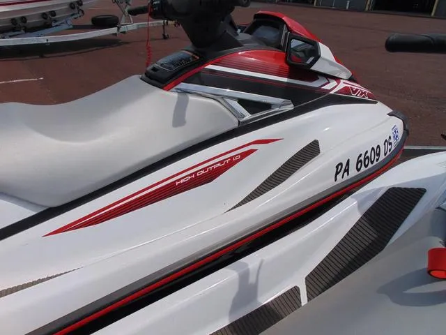 Slide: The Image of 2017 Yamaha WaveRunner VX jet ski with red and white design, high output engine. - 11