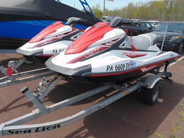 Slide: The Image of 2017 Yamaha WaveRunner VX jet skis on trailers, parked outdoors. - 4