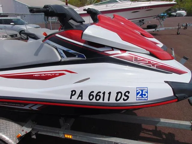 Slide: The Image of 2017 Yamaha WaveRunner VX jet ski with red and white design on a trailer. - 8