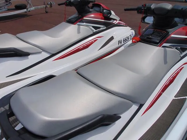 Slide: The Image of 2017 Yamaha WaveRunner VX jet skis with sleek design and red accents. - 9