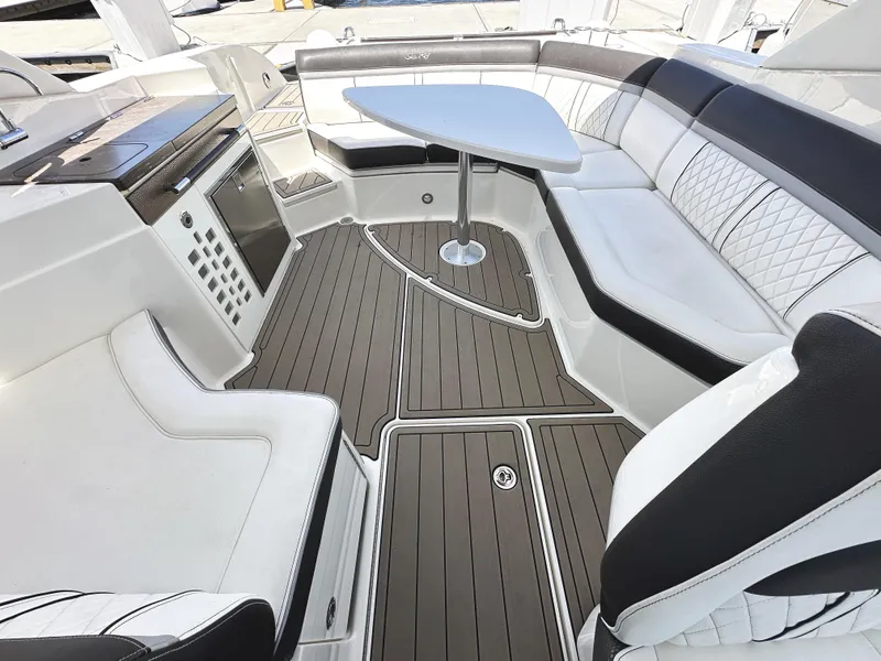 Slide: The Image of Luxurious 2017 Sea Ray SLX 350 boat interior with elegant seating and modern design. - 14