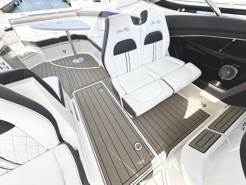 Slide: The Image of 2017 Sea Ray SLX 350 boat interior with luxurious seating and sleek design. - 18