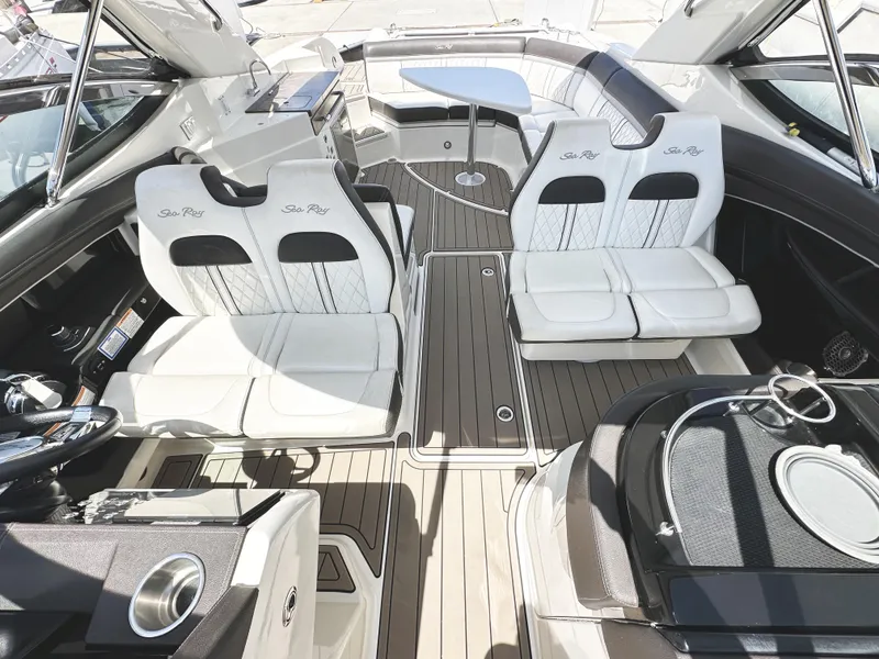 Slide: The Image of 2017 Sea Ray SLX 350 boat interior with luxurious seating and modern design. - 19