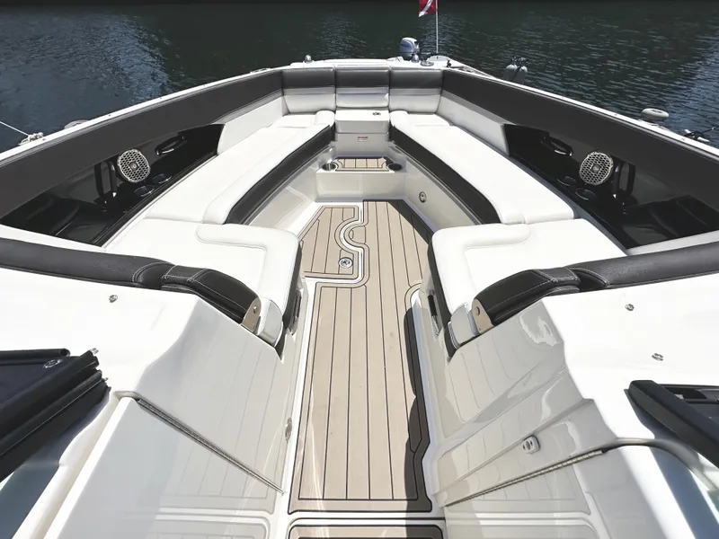 Slide: The Image of 2017 Sea Ray SLX 350 boat interior with luxurious seating and teak flooring. - 24