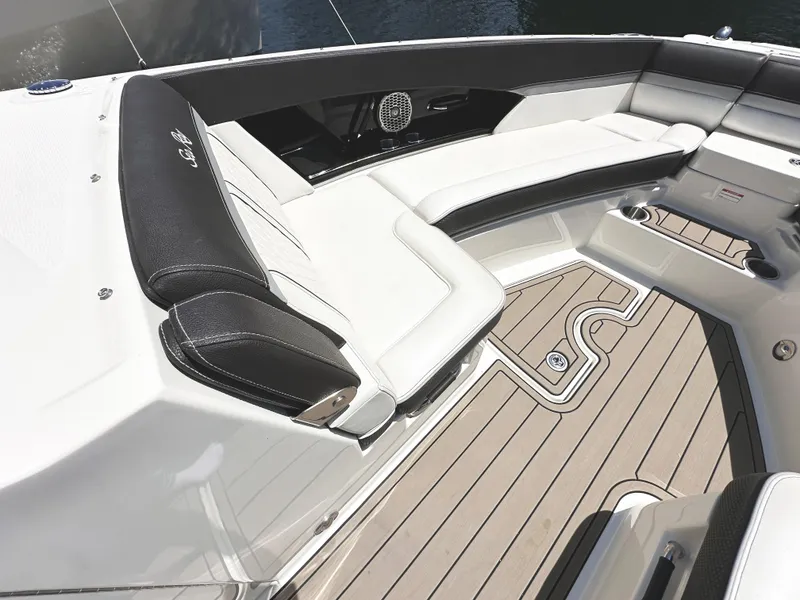 Slide: The Image of Luxurious seating area on 2017 Sea Ray SLX 350 boat with elegant design and wood flooring. - 25
