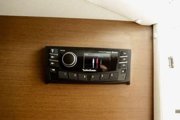 Slide: The Image of Control panel on 2017 Sea Ray SLX 350 boat interior. - 32