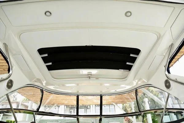 Slide: The Image of Interior view of 2017 Sea Ray SLX 350 boat's sunroof and ceiling design. - 37