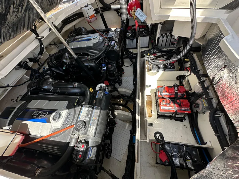 Slide: The Image of Engine compartment of 2017 Sea Ray SLX 350 with dual engines and battery setup. - 40