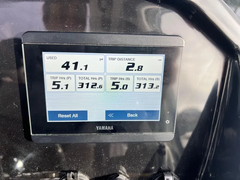Slide: The Image of Display screen on 2023 Jeanneau NC 895 showing trip data and fuel usage. - 12