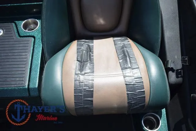 Slide: The Image of Boat seat with duct tape repair on a 2014 Ranger Z119c. - 16