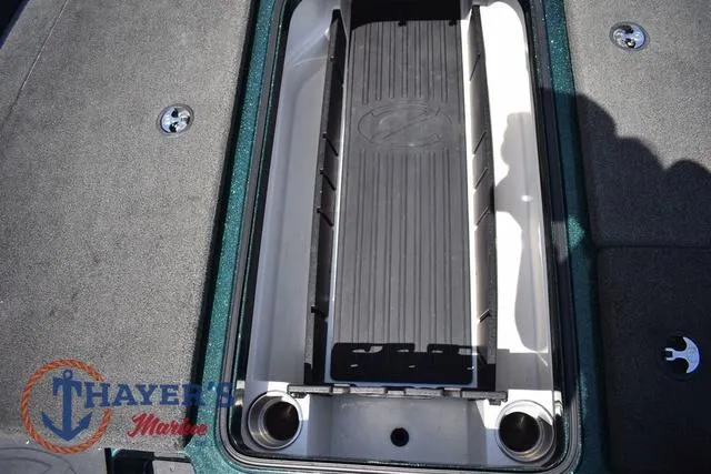 Slide: The Image of 2014 Ranger Z119c boat storage compartment with Thayer's Marine logo. - 22