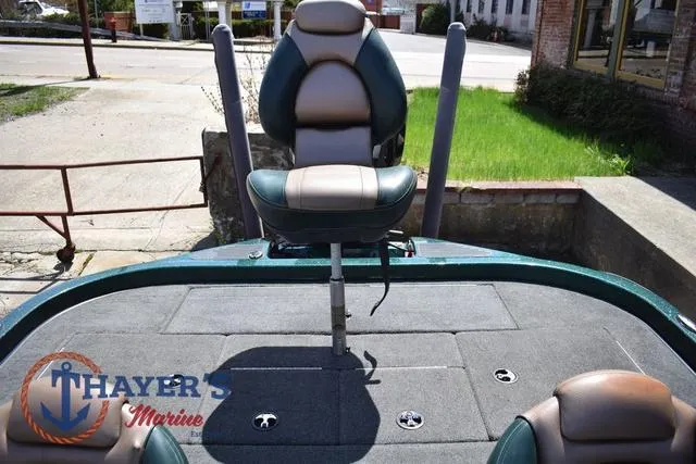 Slide: The Image of 2014 Ranger Z119c boat deck with seating and Thayer's Marine logo. - 30