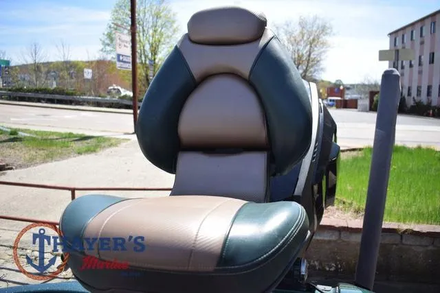 Slide: The Image of 2014 Ranger Z119c boat seat with Thayer's Marine logo, outdoors on a sunny day. - 31