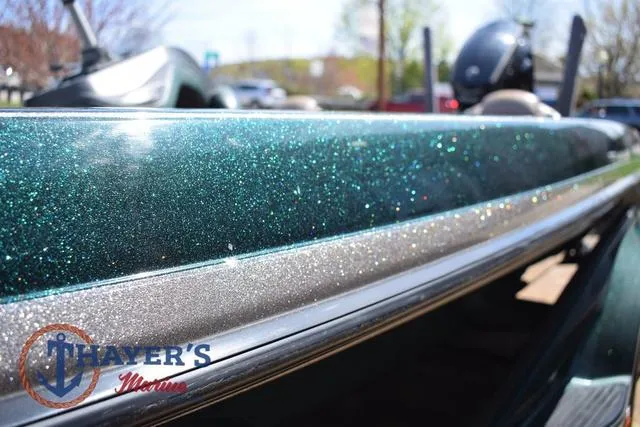 Slide: The Image of 2014 Ranger Z119c boat with sparkling green finish at Thayer's Marine. - 40
