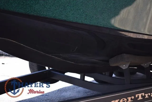 Slide: The Image of 2014 Ranger Z119c boat hull on trailer at Thayer's Marine. - 41