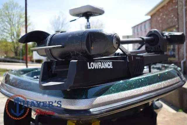 Slide: The Image of 2014 Ranger Z119c boat with Lowrance trolling motor, outdoor setting. - 42
