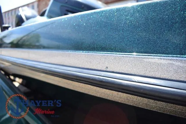 Slide: The Image of 2014 Ranger Z119c boat close-up with metallic finish, featuring Nayer's Marine logo. - 44