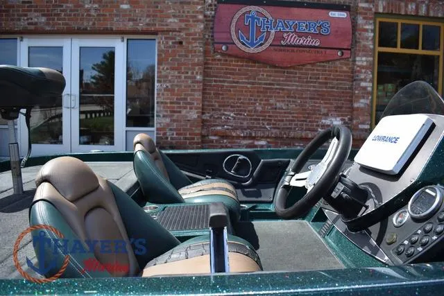 Slide: The Image of 2014 Ranger Z119c boat interior at Thayer's Marine dealership. - 8