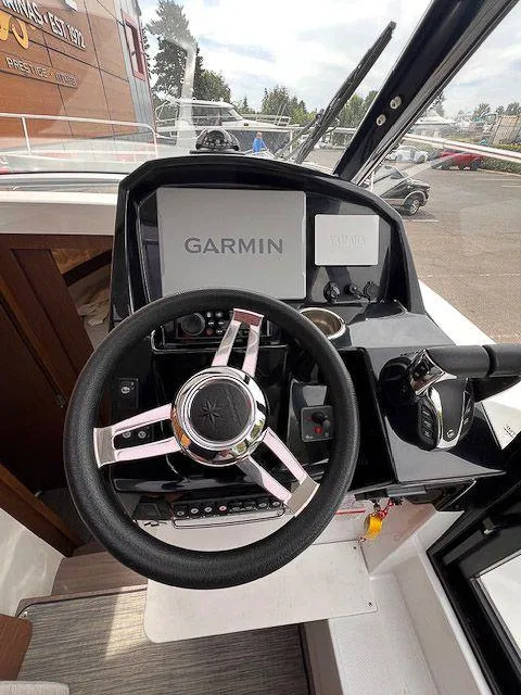 Slide: The Image of Helm of 2023 Jeanneau NC 895 with Garmin navigation system. - 10