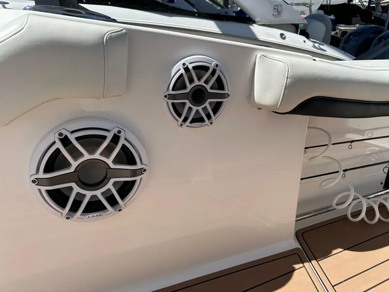 Slide: The Image of 2022 Tidewater 280 CC boat speakers and seating detail. - 29