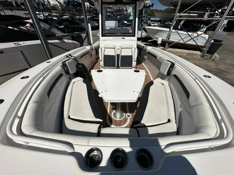 Slide: The Image of 2022 Tidewater 280 CC boat interior with spacious seating and modern design. - 35