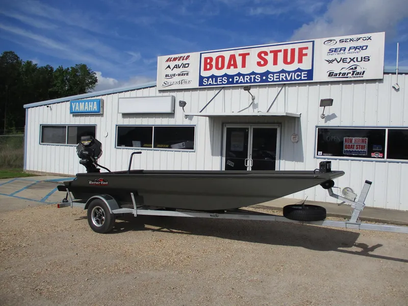 Slide: The Image of 2025 Gator Tail 1748 GATOR boat on trailer outside Boat Stuf store. - 1