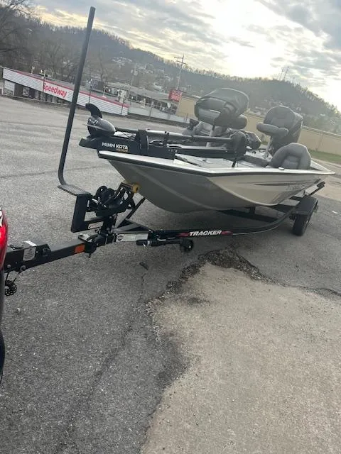 Slide: The Image of 2023 Tracker Pro Team 175 TXW boat on trailer, parked outdoors. - 7