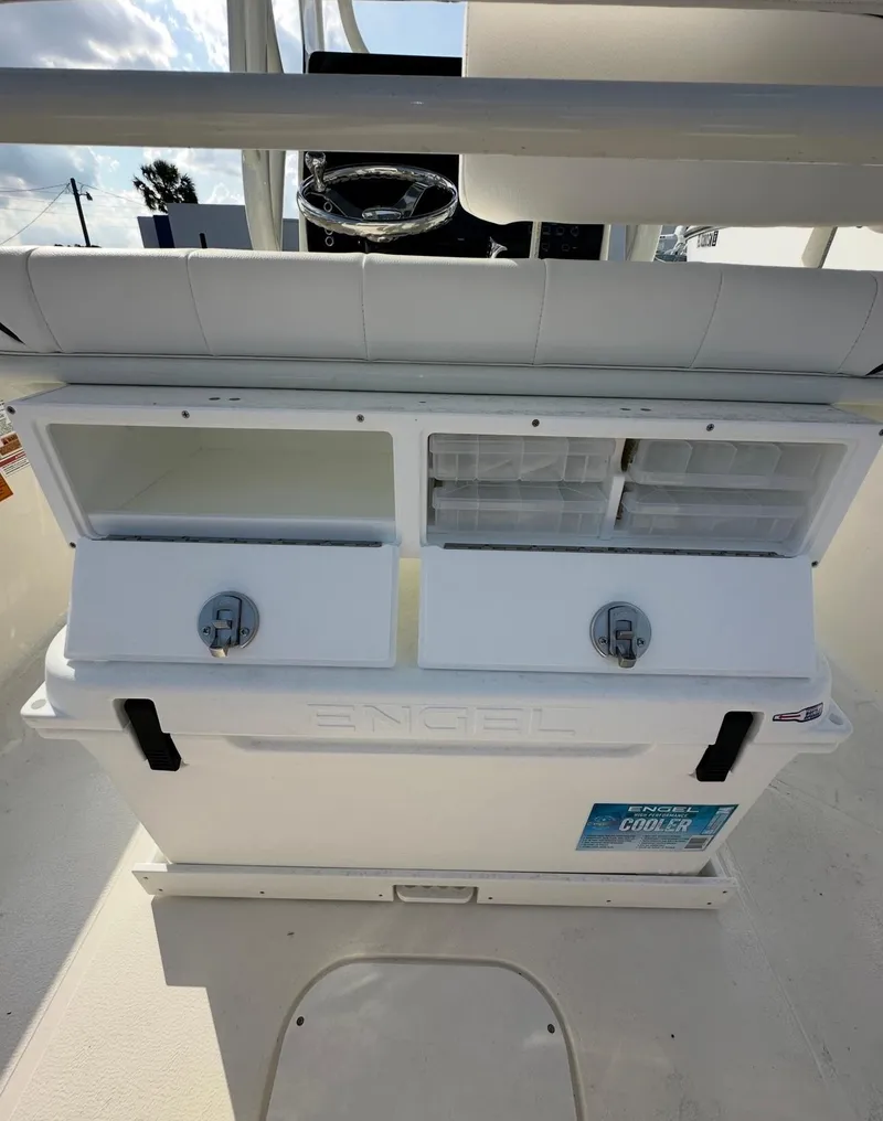 Slide: The Image of 2025 Skeeter SX 2350 boat console with Engel cooler and storage compartments. - 10