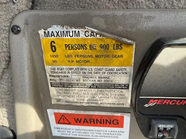 Slide: The Image of 2001 Tracker Pro Deep V 17 SC capacity label, 6 persons or 900 lbs, 90 HP motor. - 9