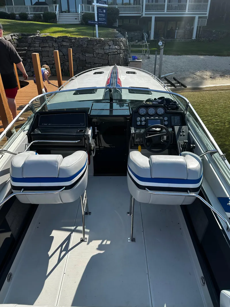 Slide: The Image of 1987 Formula 357 SR1 boat interior with dual seats and control panel. - 6