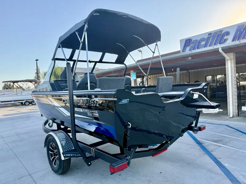 Slide: The Image of Crestliner Fish Hawk 1750 WT w/ 115HP Mercury Pro XS! 2025 - 2