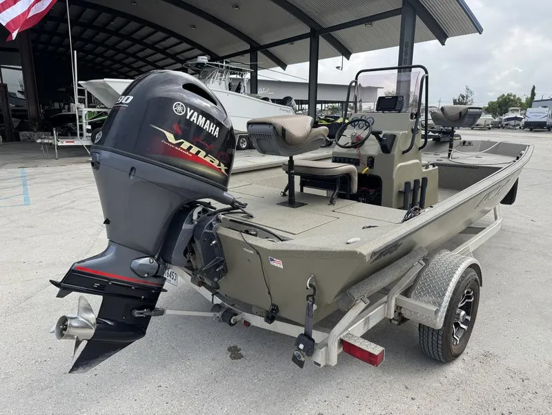 Slide: The Image of 2019 Alumacraft 18 Bay boat with Yamaha Vmax engine on trailer. - 7
