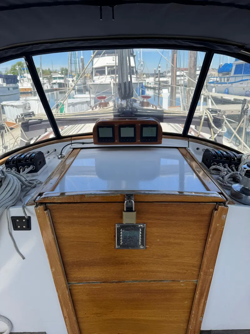 Slide: The Image of Cockpit view of 1984 Ohlson 38 sailboat docked at marina. - 17