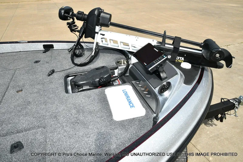 Slide: The Image of 2024 Triton 18 TRX boat deck with Lowrance electronics and Minn Kota Ultrex trolling motor. - 32